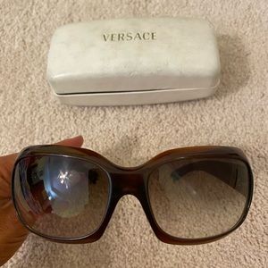 Gently used brown Versace sunglasses
